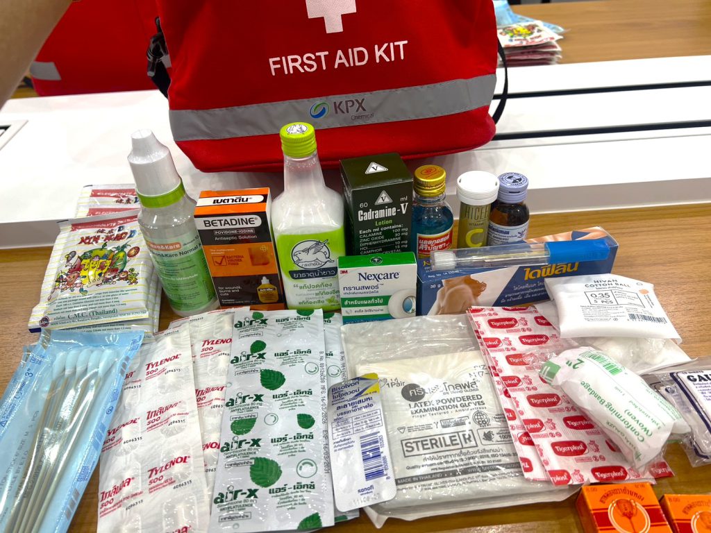 KPX Chemical employees preparing medicine and basic wellness kits for youth CSR activity